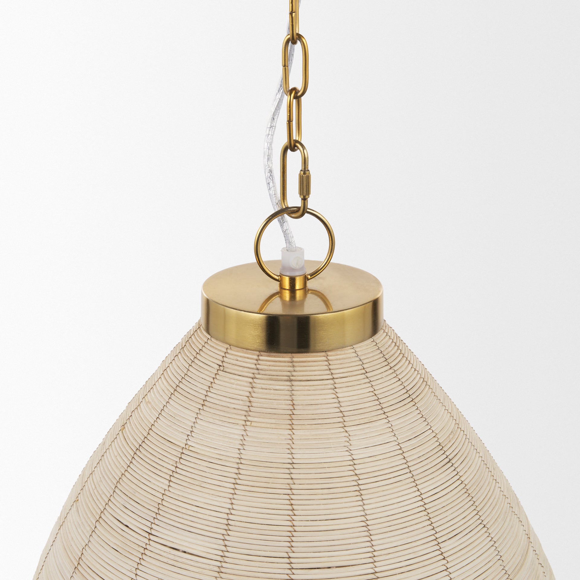 Saliha Cane w/ Brass Metal Pendant Light viewed from the side.