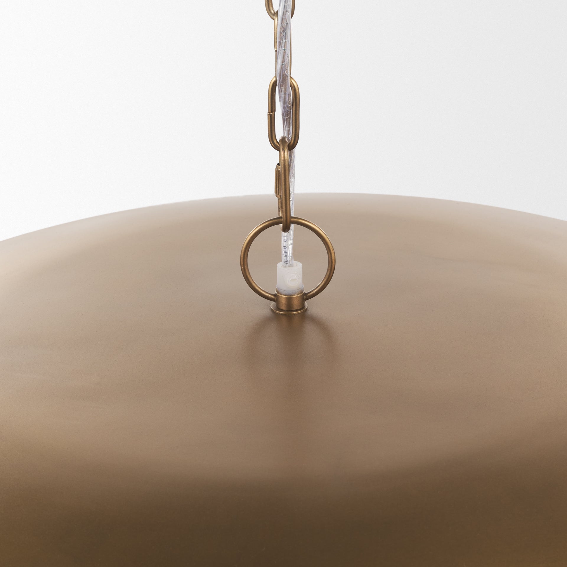 Sanne Antiqued Gold Metal w/ Silver Foil Wide Pendant Light viewed from the side.
