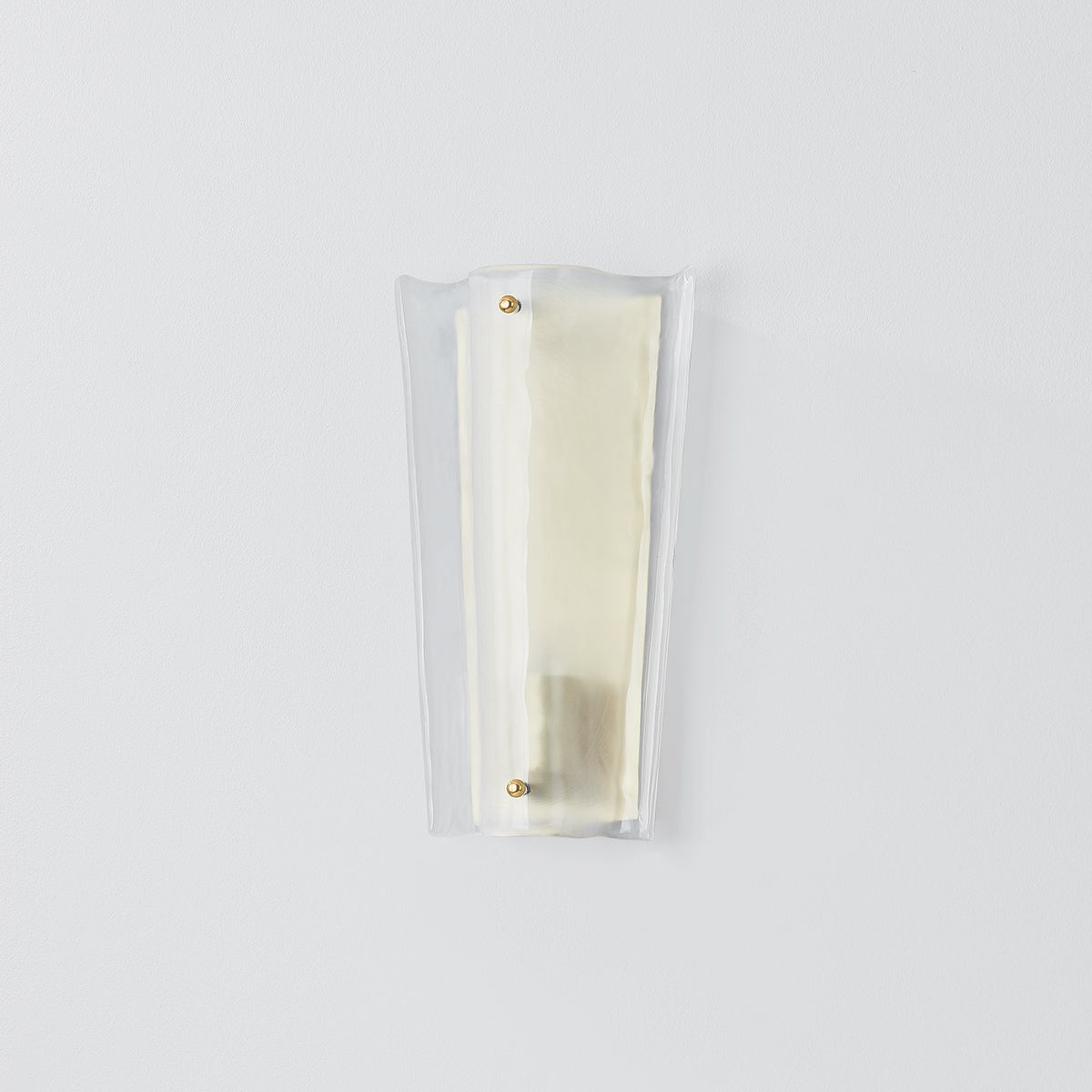 Baxford Wall Sconce in aged brass shown from a second angle to highlight the arm curve and shade silhouette.