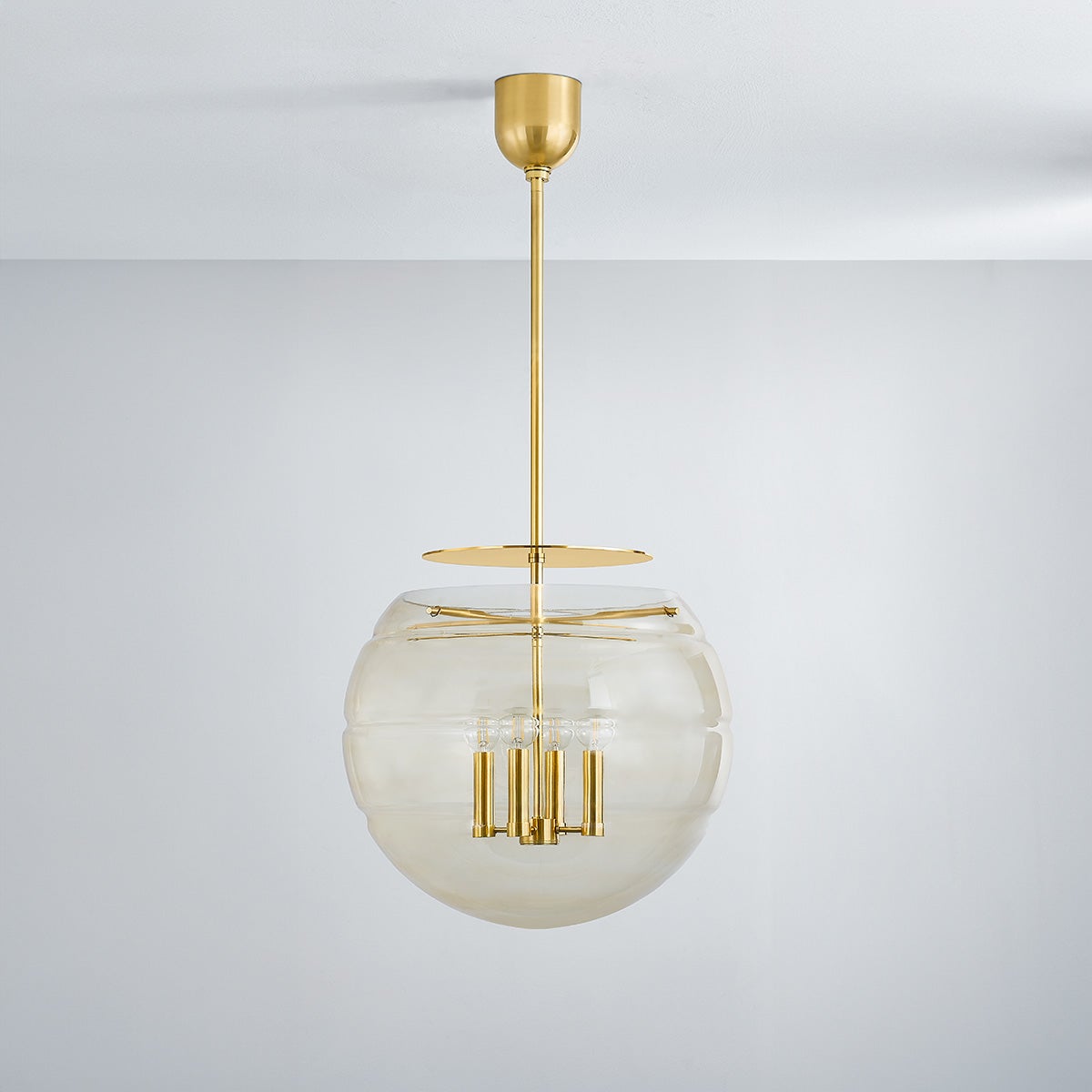 Gill Pendant 19.5" in aged brass shown from a second angle to highlight the shade shape and metal detail.
