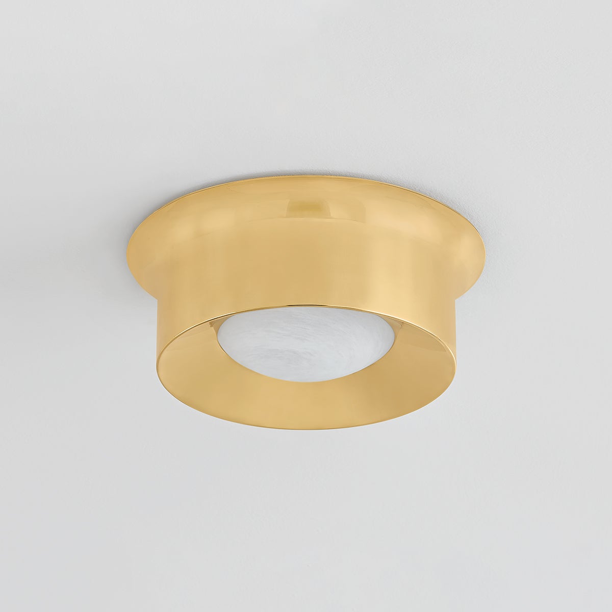 Noxon Flush Mount 13.75" in aged brass shown from the front to reveal the shade profile and mounting canopy.