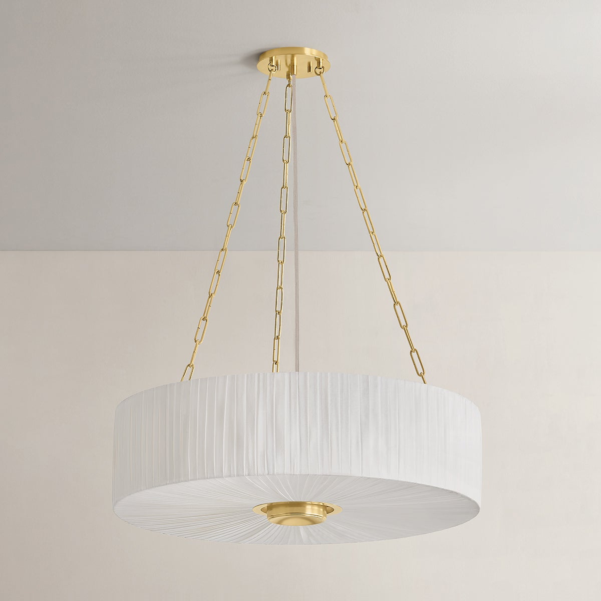 Camby Chandelier in aged brass shown from the front to reveal the frame, arms, and shade detail.