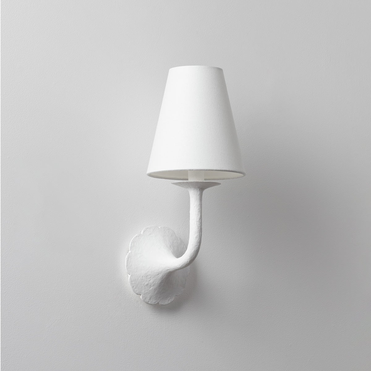 Close-up of the Winnipeg Wall Sconce showing the arm curve and shade silhouette.