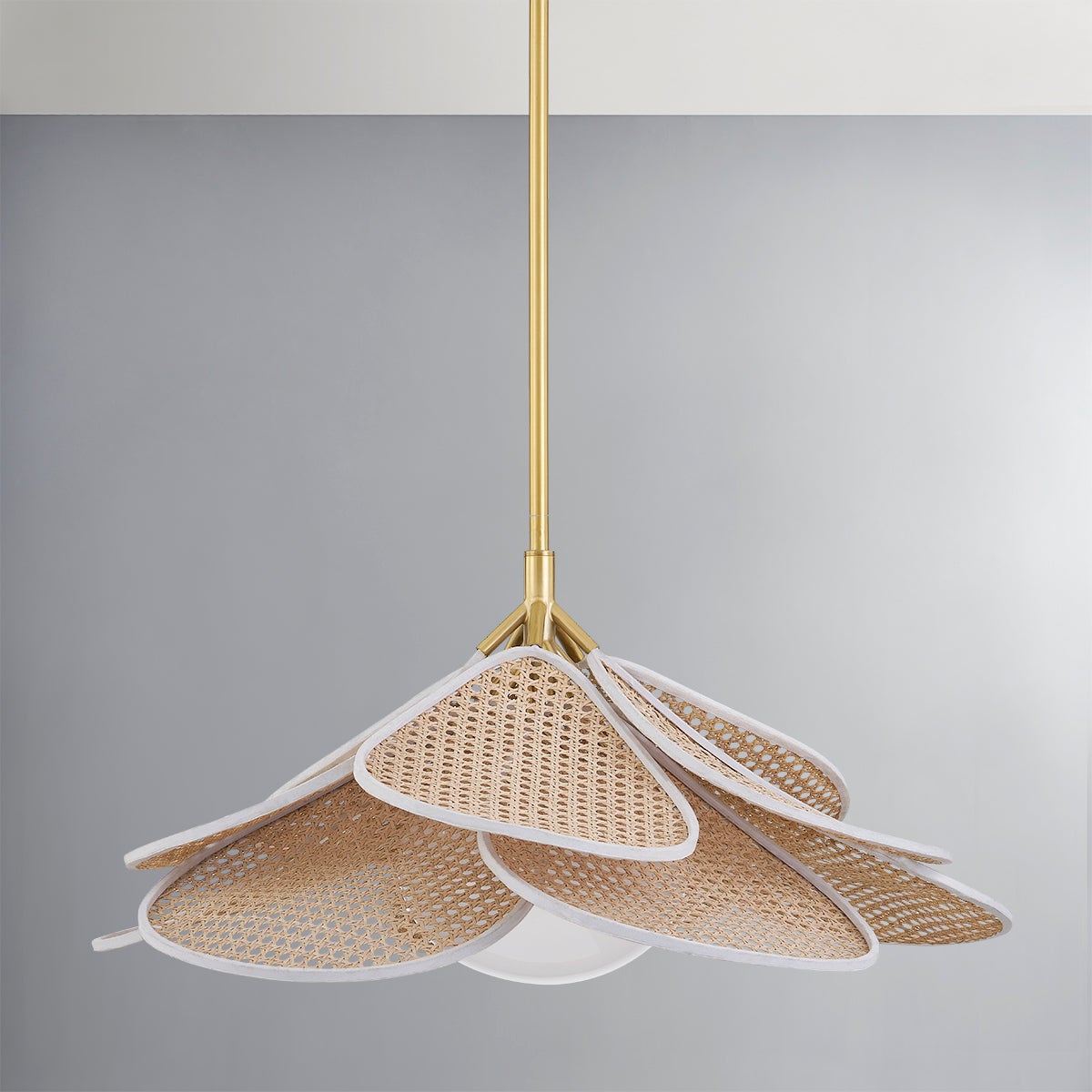 Florina Pendant 28" in aged brass shown from a second angle to highlight the shade shape and metal detail.