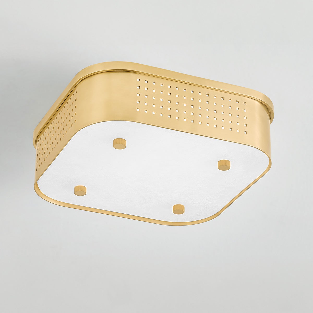 Close-up of the Madison Square Flush Mount in aged brass showing the shade profile and mounting canopy.