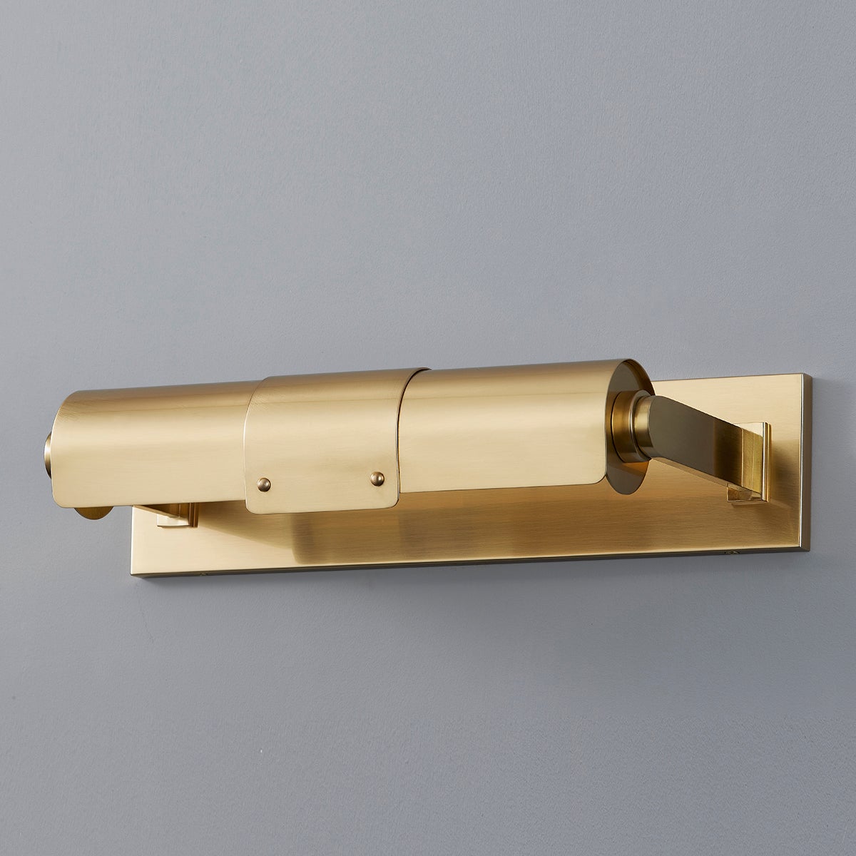 Oneonta Picture Light 15.25" in aged brass shown from the front to reveal the arm curve and shade proportion.