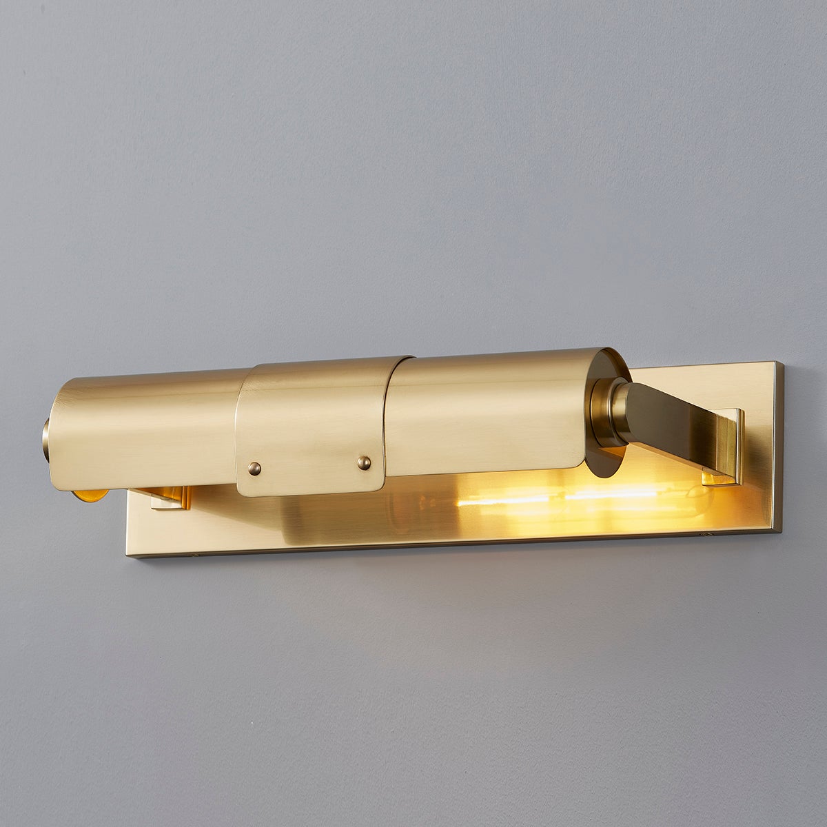 Close-up of the Oneonta Picture Light 15.25" in aged brass showing the arm curve and shade proportion.