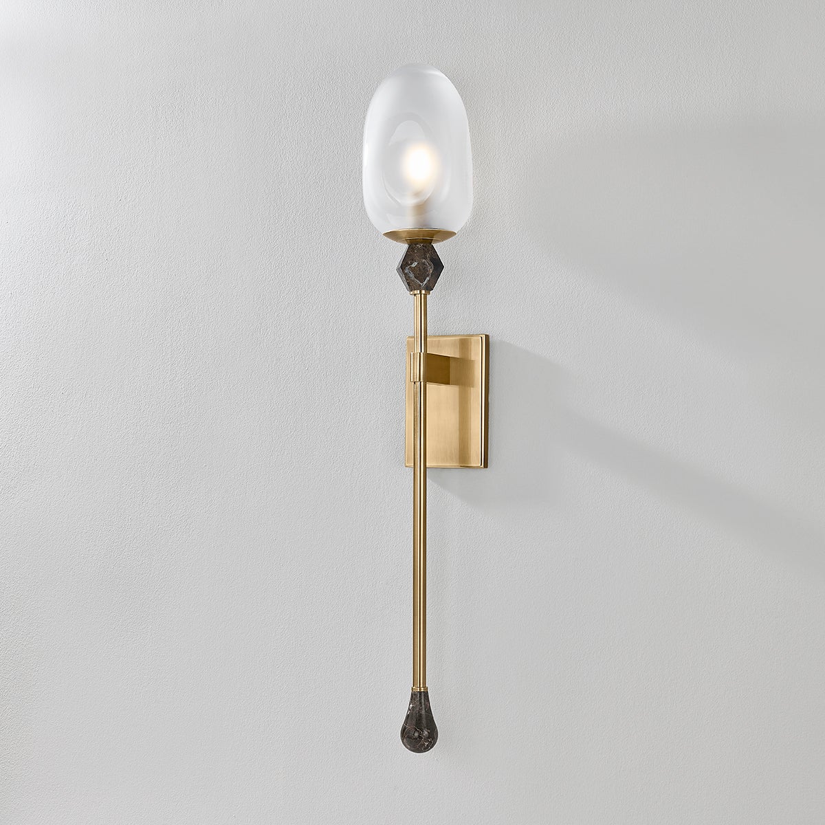Daith Wall Sconce shown from the front to reveal the arm curve and shade silhouette.