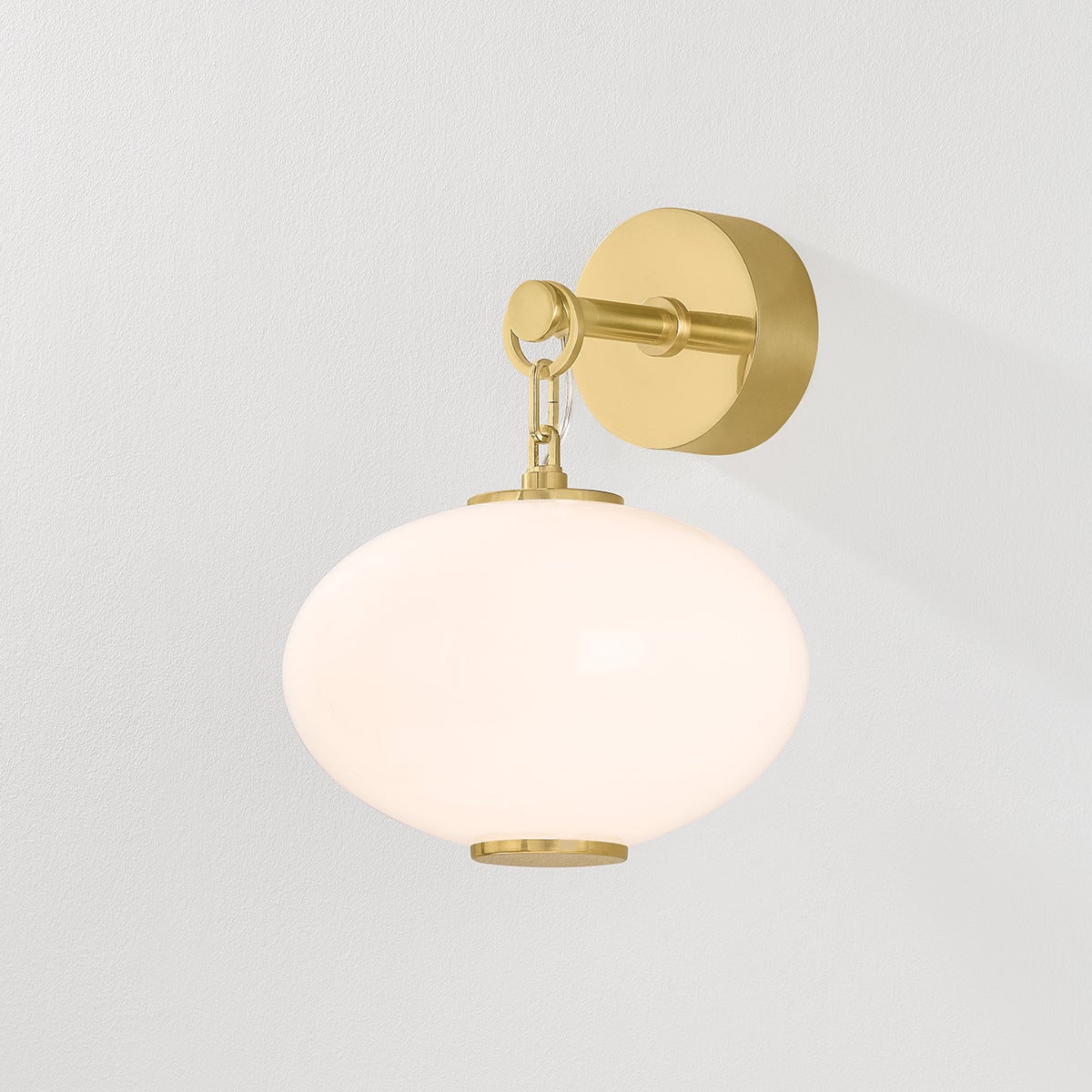 Close-up of the Nephele Wall Sconce showing the arm curve and shade silhouette.