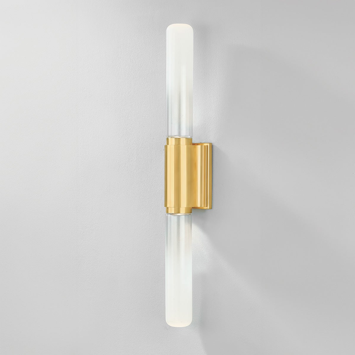 Close-up of the Colrain Wall Sconce 5.25" x 31.75" in aged brass showing the arm curve and shade silhouette.