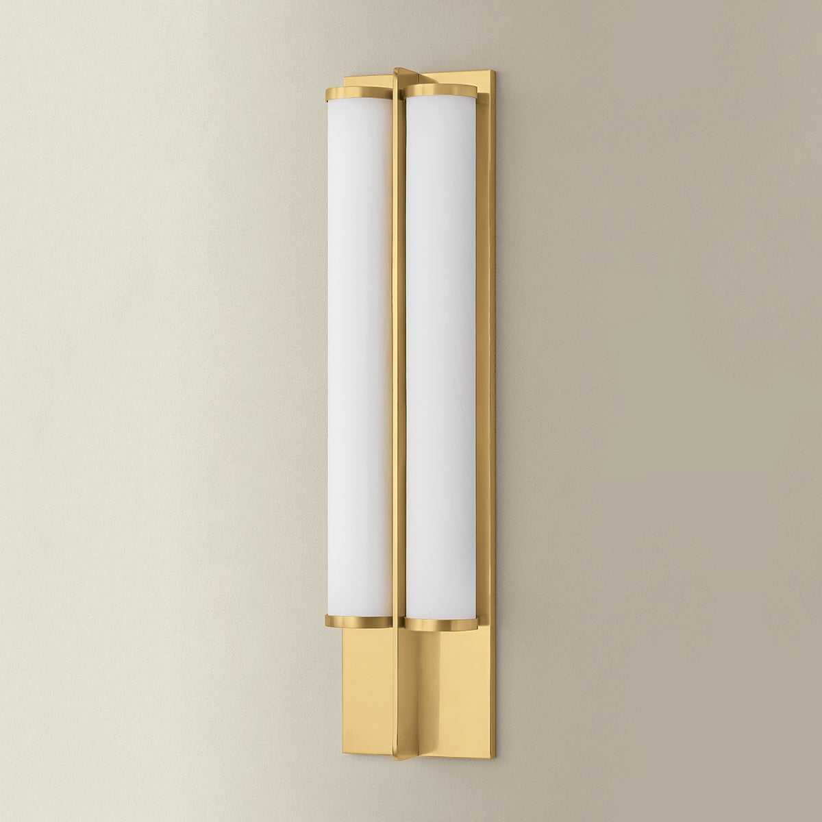 Northfield Wall Sconce 5.5" in aged brass shown from a second angle to highlight the arm curve and shade silhouette.