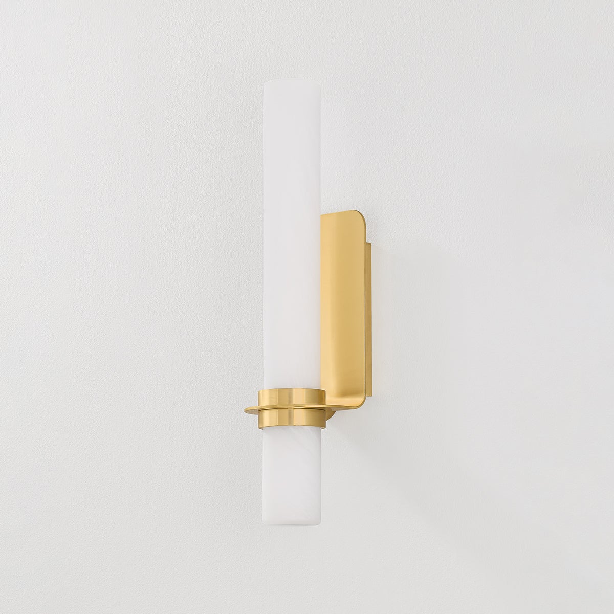 Groveland Station Wall Sconce 4.75" x 18" in aged brass shown from a second angle to highlight the arm curve and shade silhouette.