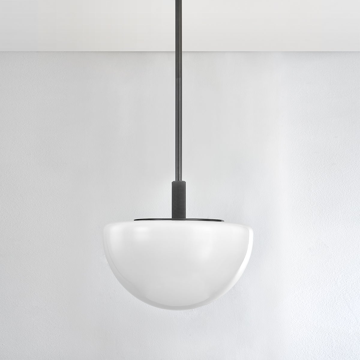 Close-up of the Lethbridge Pendant 19" in bronze showing the shade shape and metal detail.