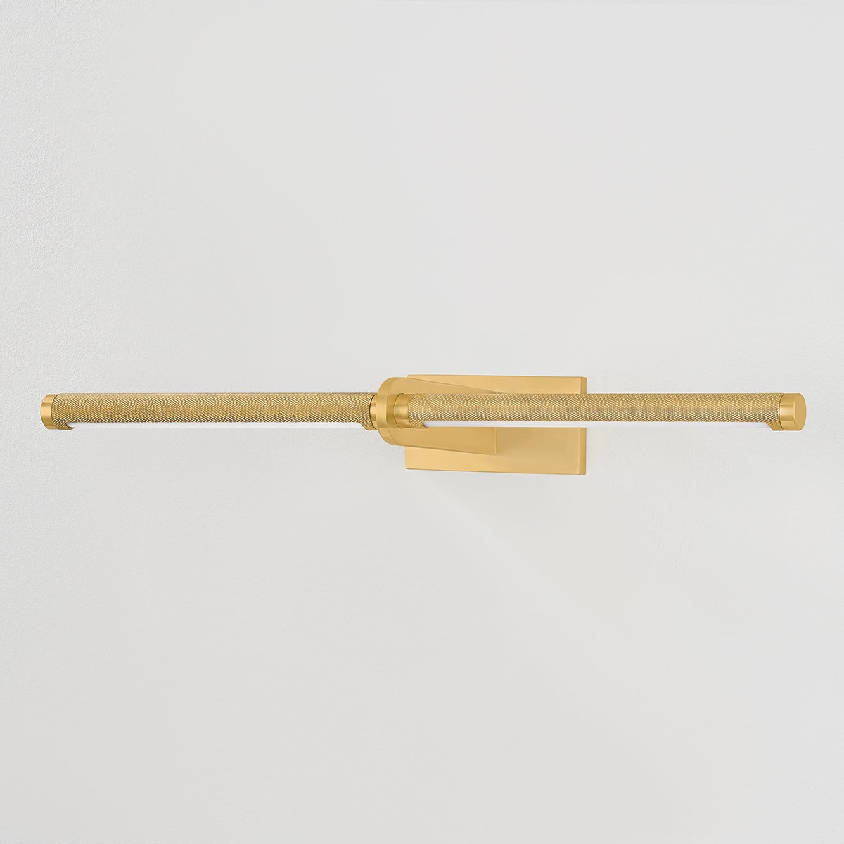Close-up of the Deptford Picture Light 24" in aged brass showing the arm curve and shade proportion.