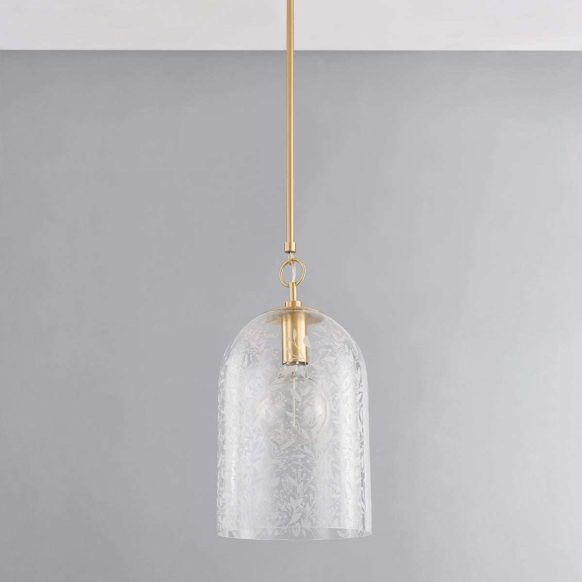 Belleville Pendant 10" in aged brass shown from the front to reveal the shade shape and metal detail.
