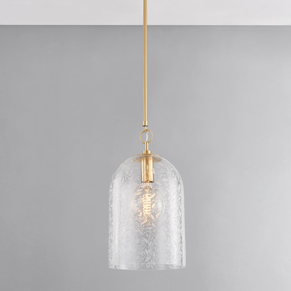Close-up of the Belleville Pendant 10" in aged brass showing the shade shape and metal detail.