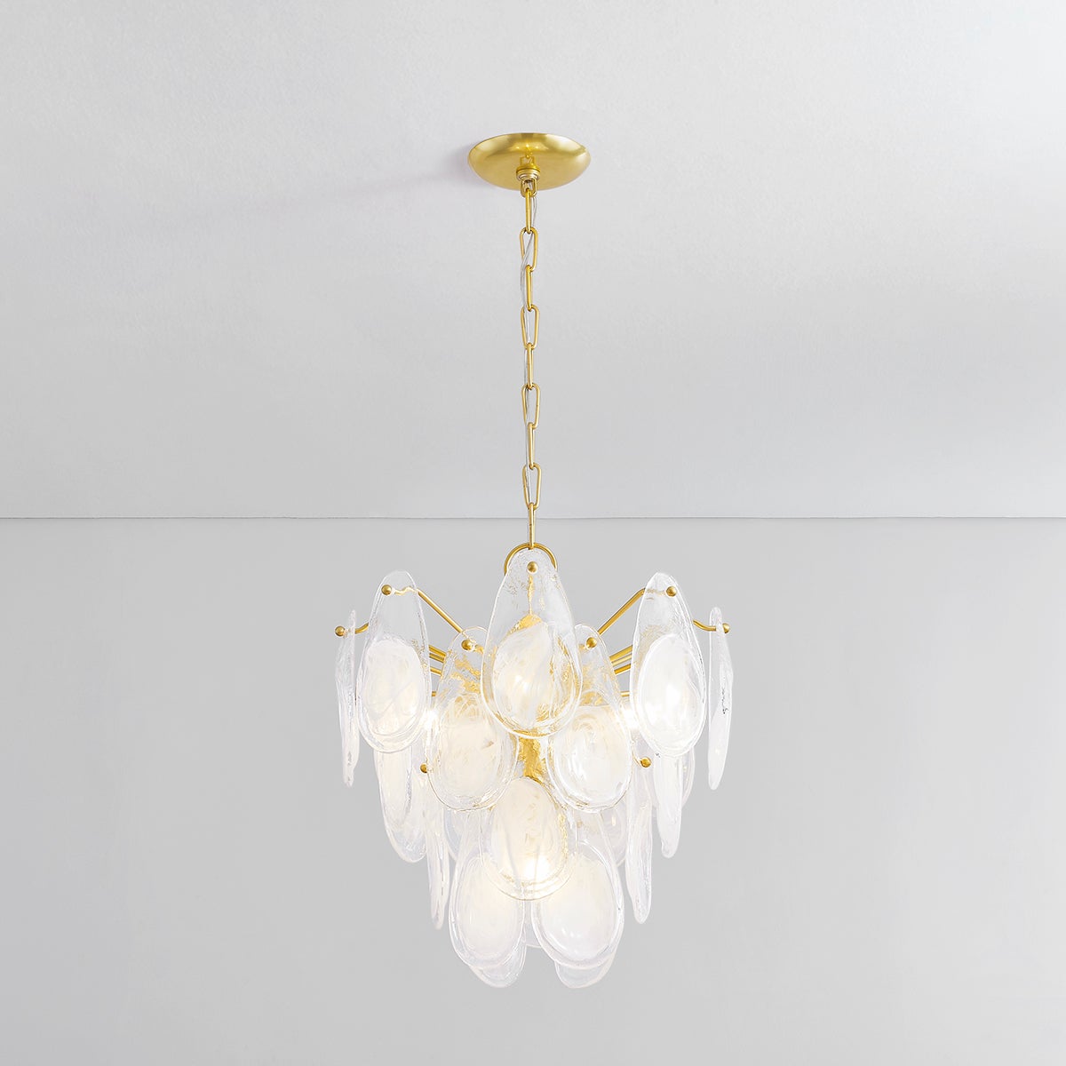 Close-up of the Darcia Chandelier 18" in aged brass showing the frame, arms, and shade detail.