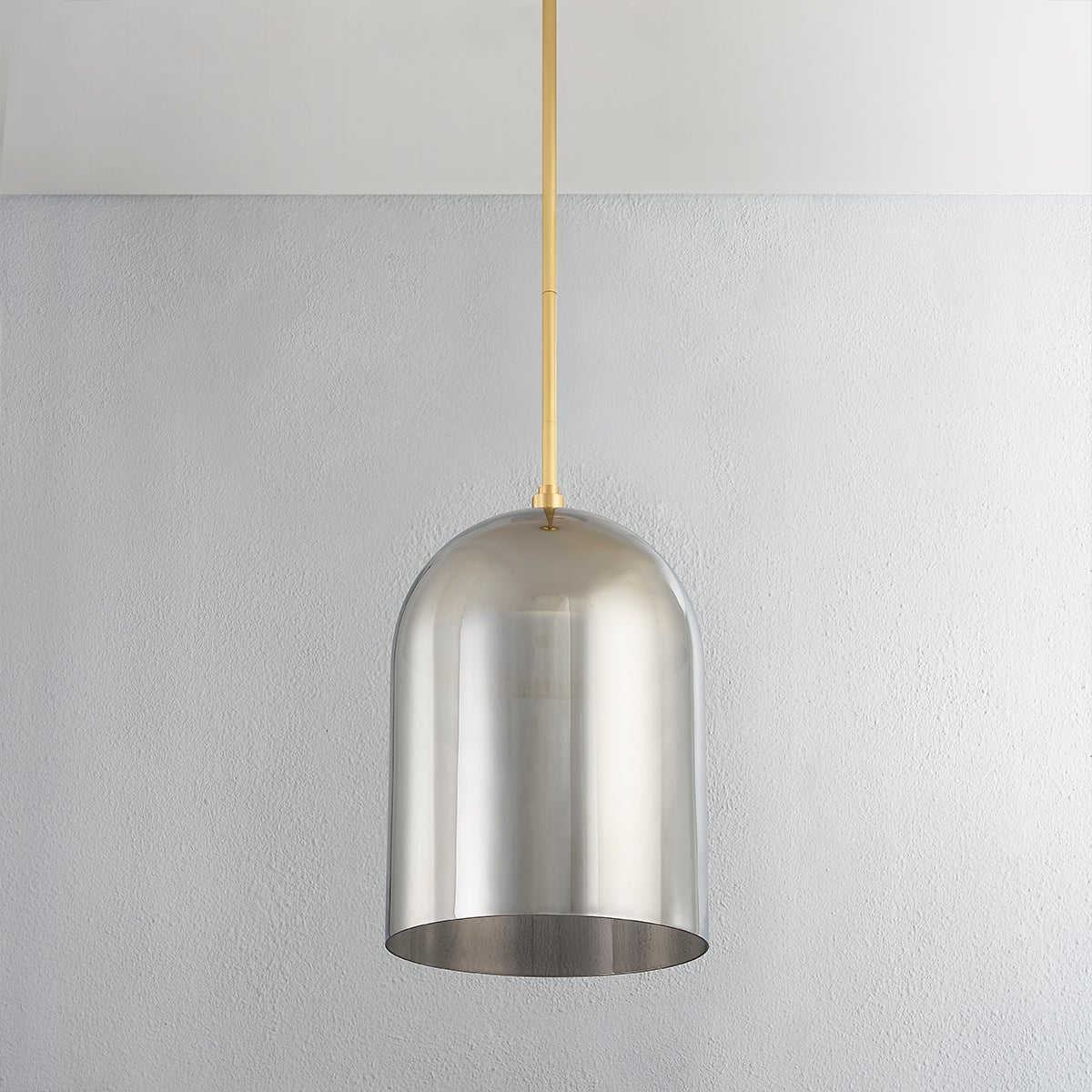 Dorval Pendant 13" in aged brass shown from a second angle to highlight the shade shape and metal detail.