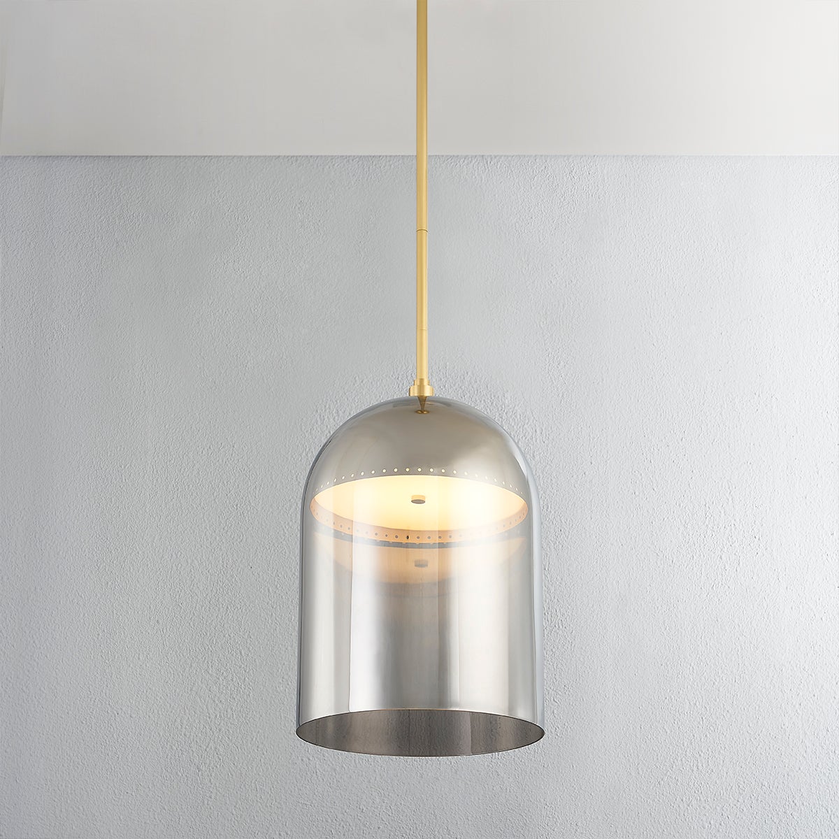 Close-up of the Dorval Pendant 13" in aged brass showing the shade shape and metal detail.