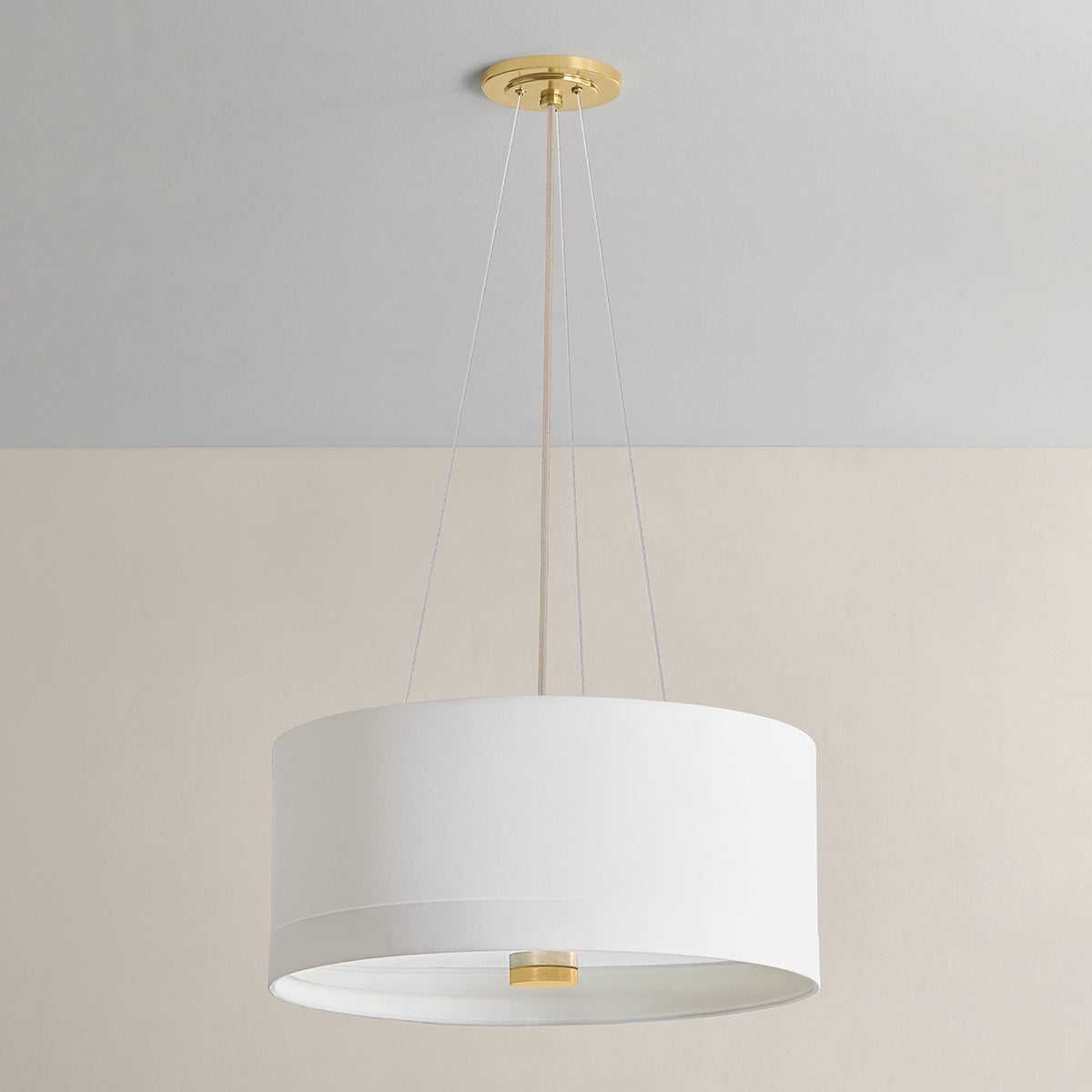 Ashland Pendant 22" in aged brass shown from the front to reveal the shade shape and metal detail.