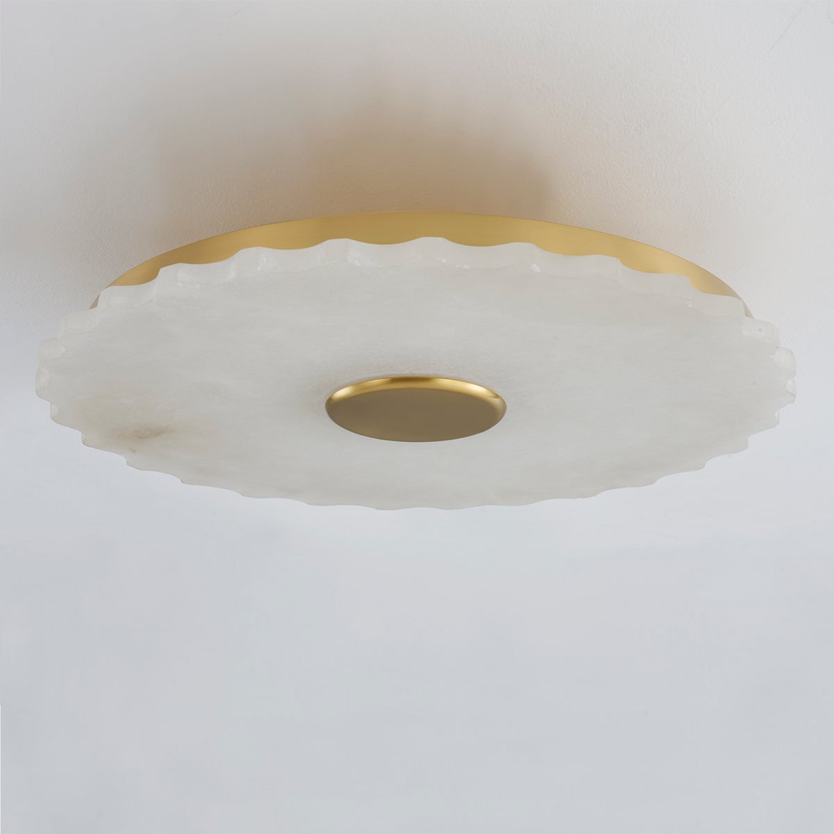 Highland Falls Flush Mount in aged brass shown from a second angle to highlight the shade profile and mounting canopy.