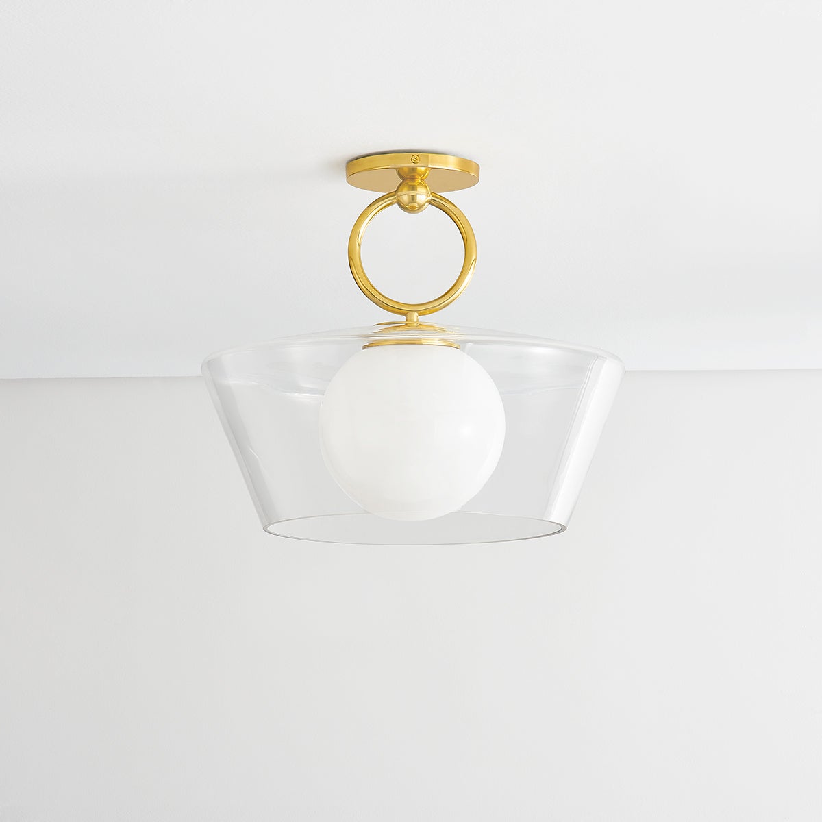 Elmsford Semi Flush in aged brass shown from a second angle to highlight the shade profile and mounting canopy.