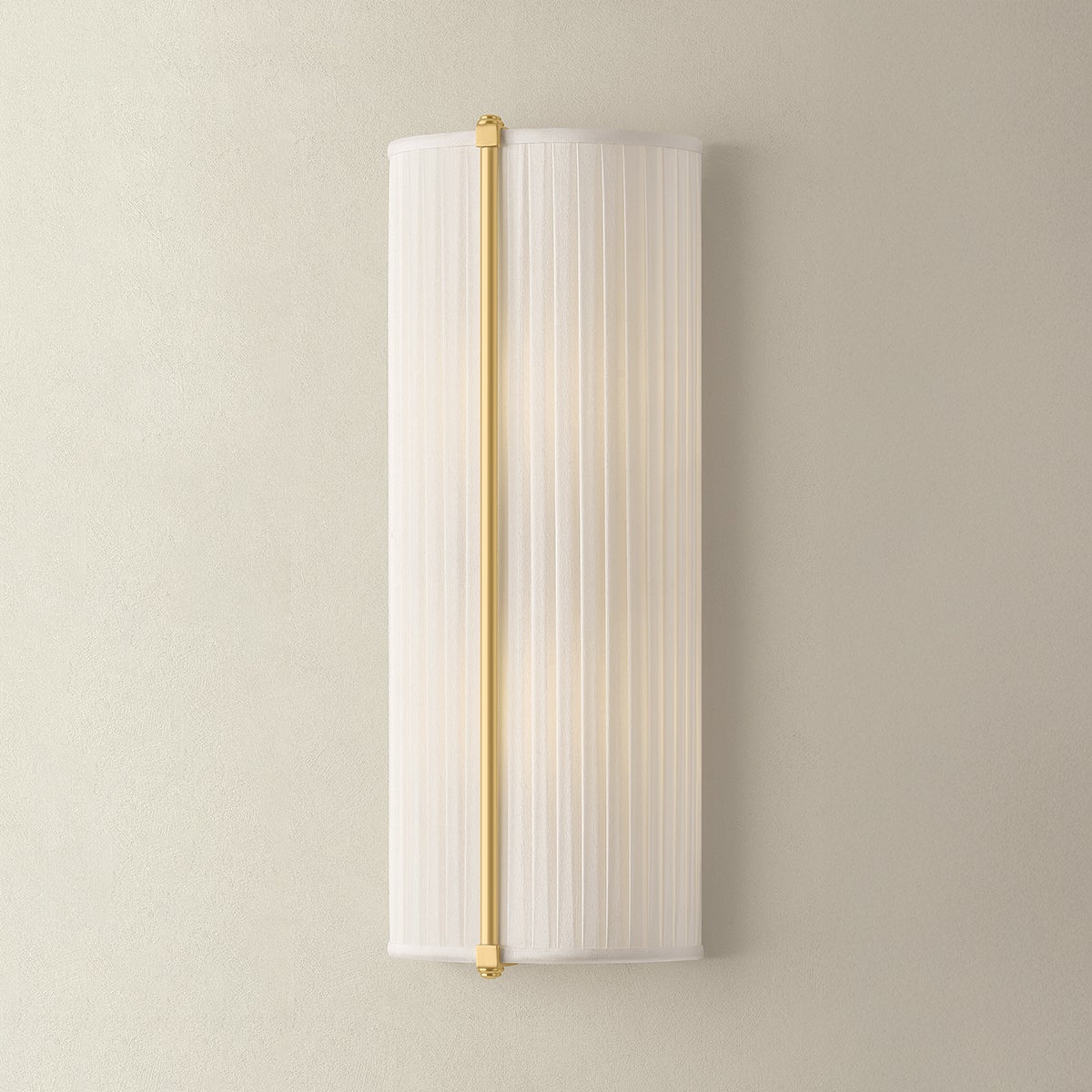 Cornell Wall Sconce 6.5" in aged brass shown from the front to reveal the arm curve and shade silhouette.