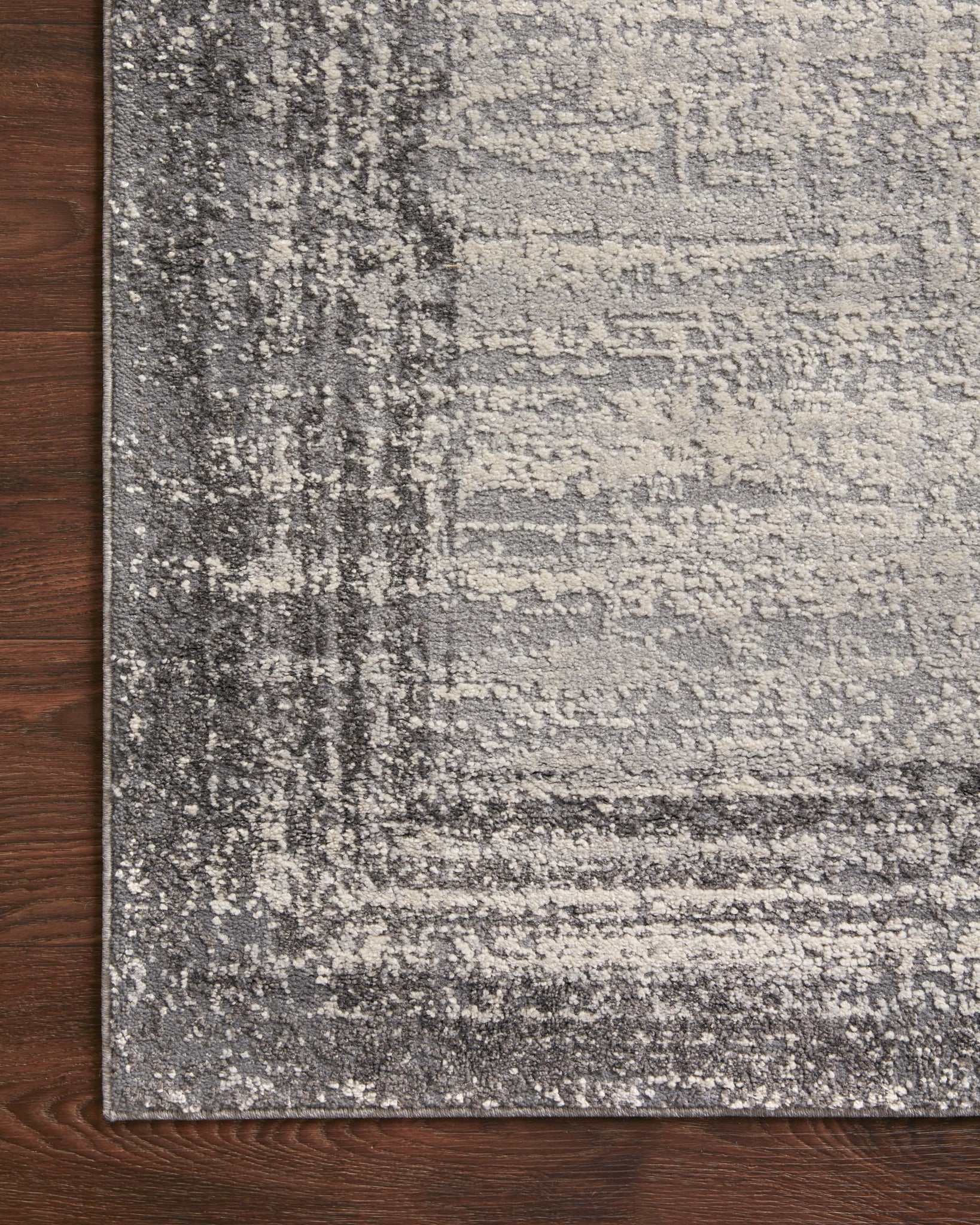 Austen Pebble / Charcoal (Pattern 2) styled in a living room at Laurie Yapp Home.