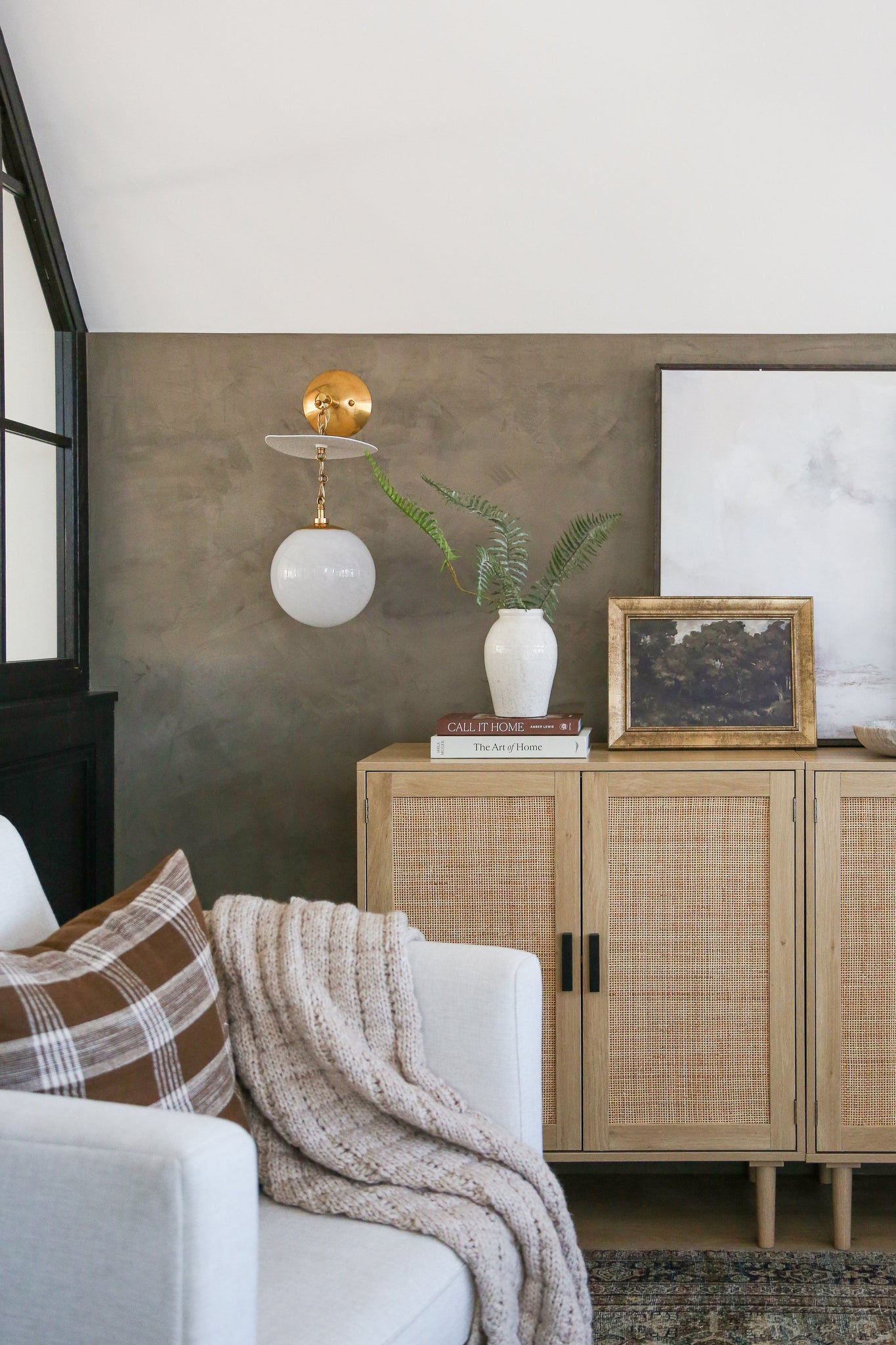 Antoinette Wall Sconce styled in a warmly lit hallway for warm, layered light at Laurie Yapp Home.