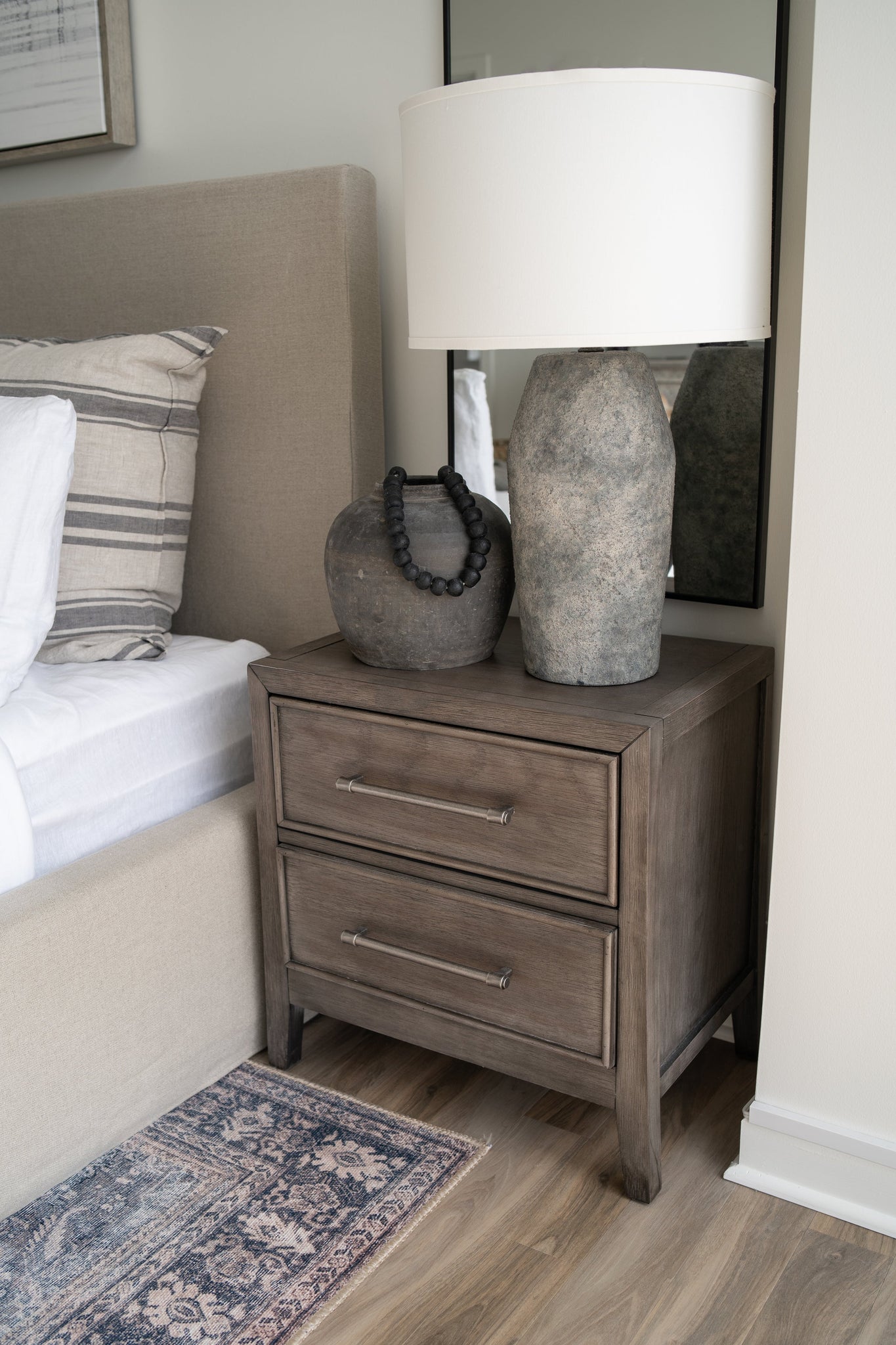 Artifact Table Lamp 17.25" styled in a bedroom nightstand for warm, layered light at Laurie Yapp Home.