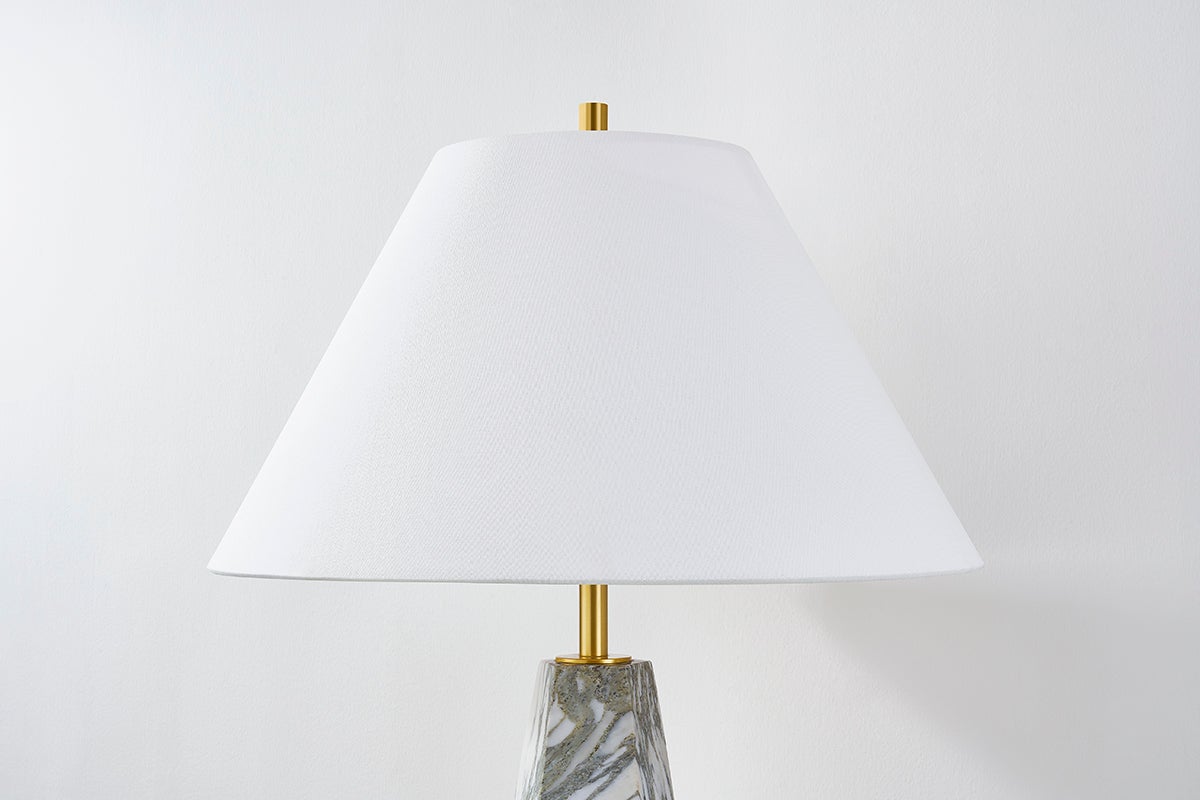 Benicia Table Lamp in aged brass shown from the front to reveal the base and shade proportions.