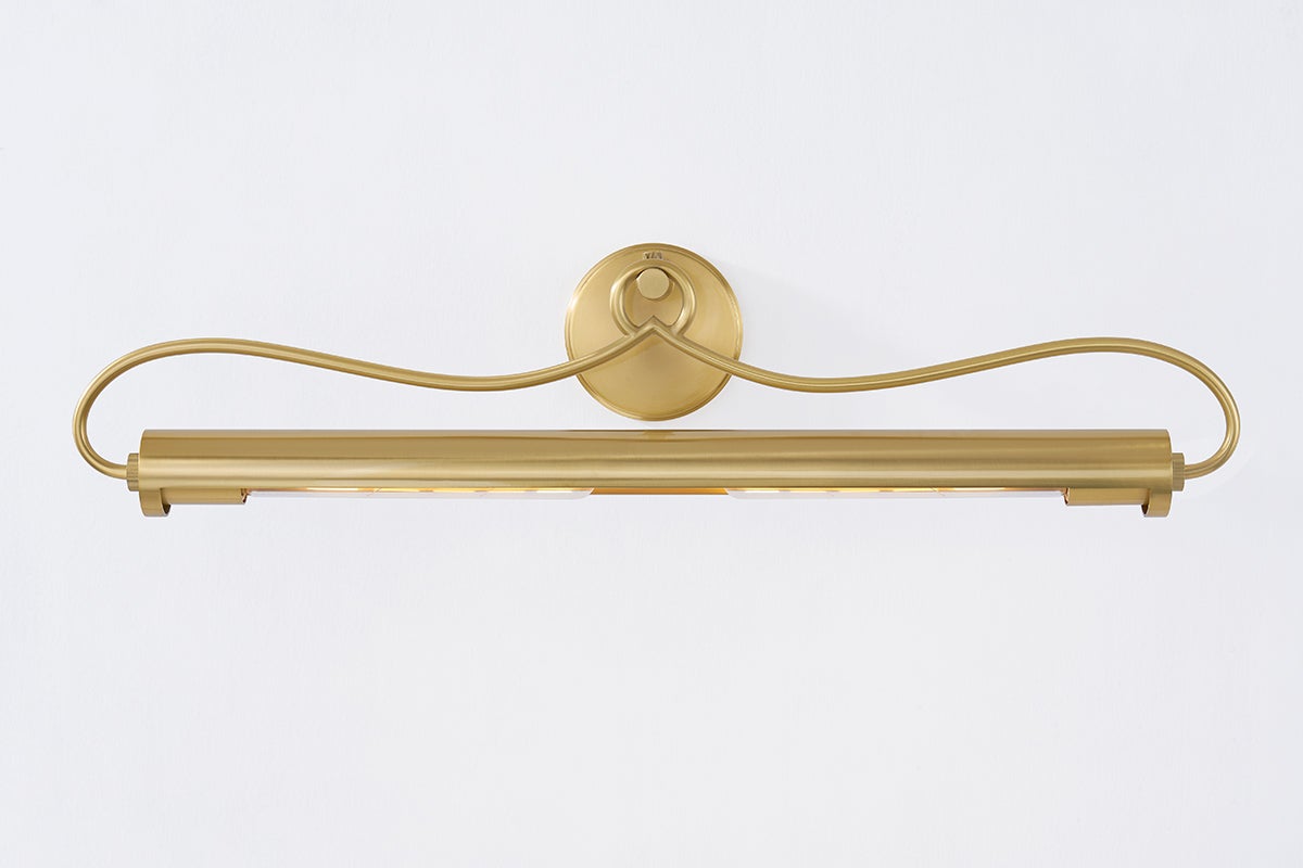 Berun Picture Light 28.25" in aged brass shown from the front to reveal the arm curve and shade proportion.