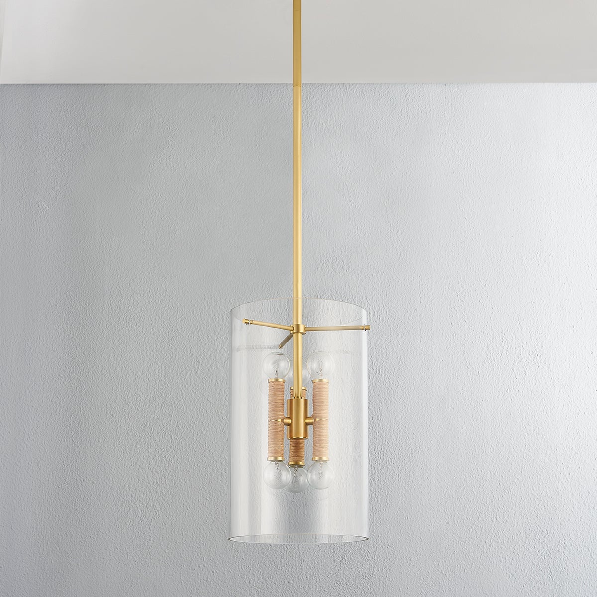 Close-up of the Barlow Lantern 11" in aged brass showing the frame and glass panel detail.
