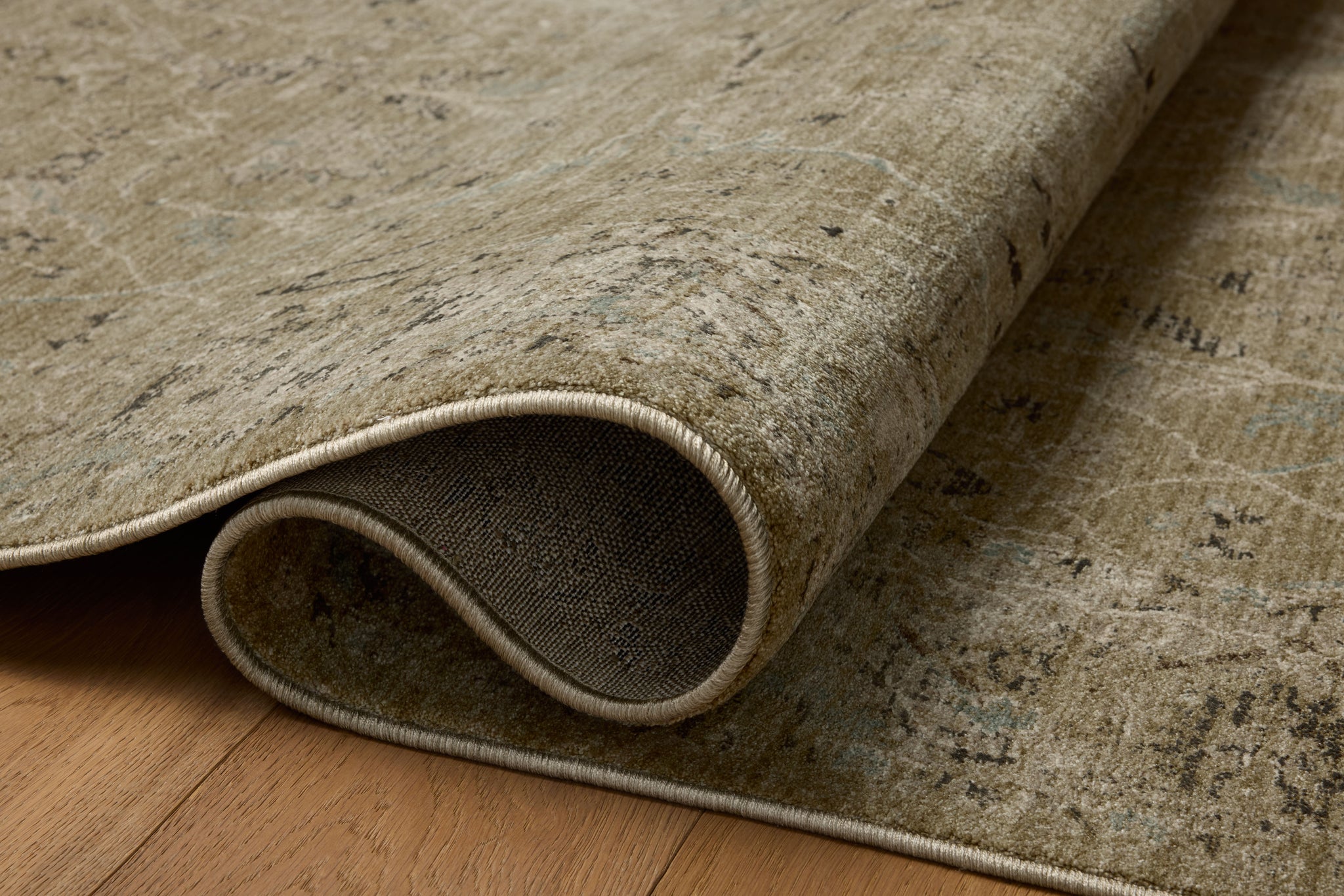 Briar Olive / Stone shown from a different angle to reveal its pattern.
