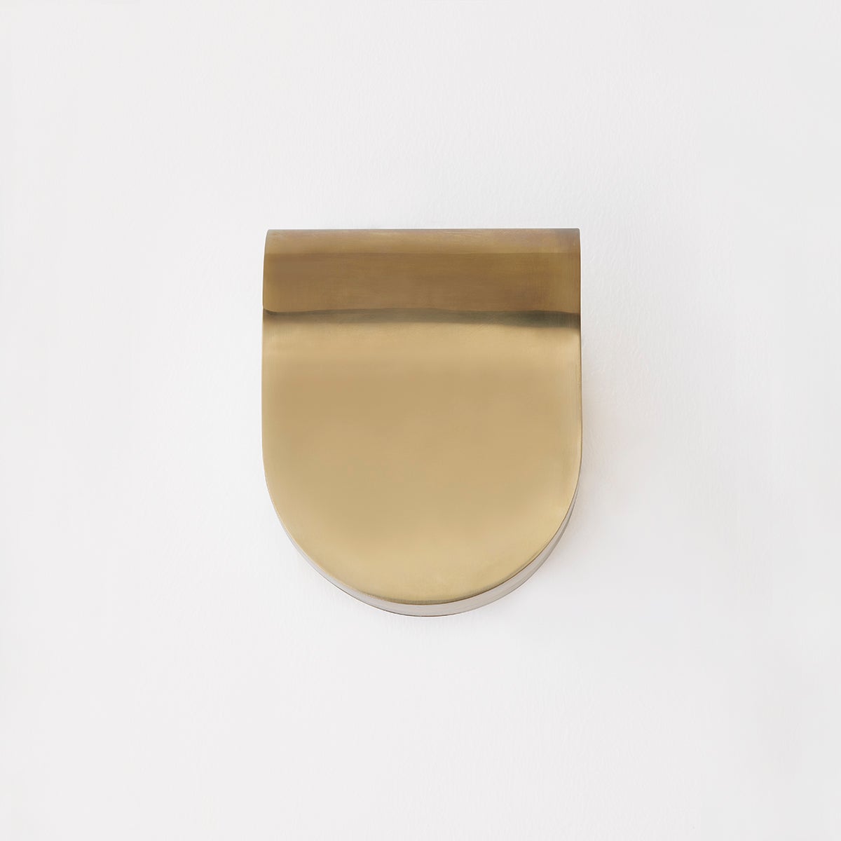 Briarwood Wall Sconce 6.5" in aged brass shown from the front to reveal the arm curve and shade silhouette.
