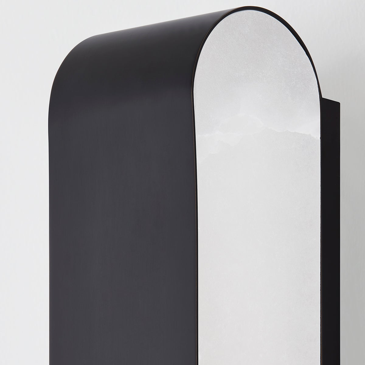 Close-up of the Briarwood Wall Sconce 3.75" showing the arm curve and shade silhouette.