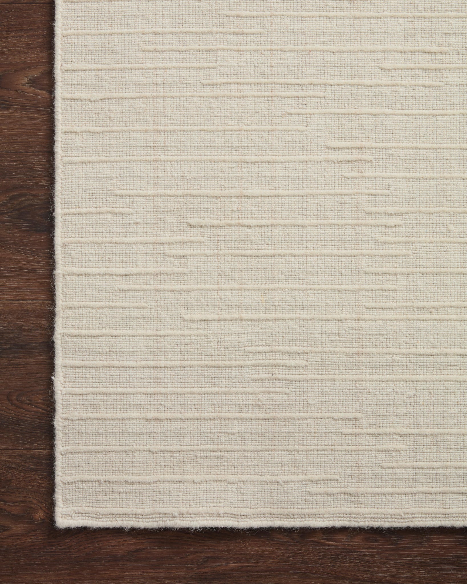 Side view of the Brooks Ivory rug.