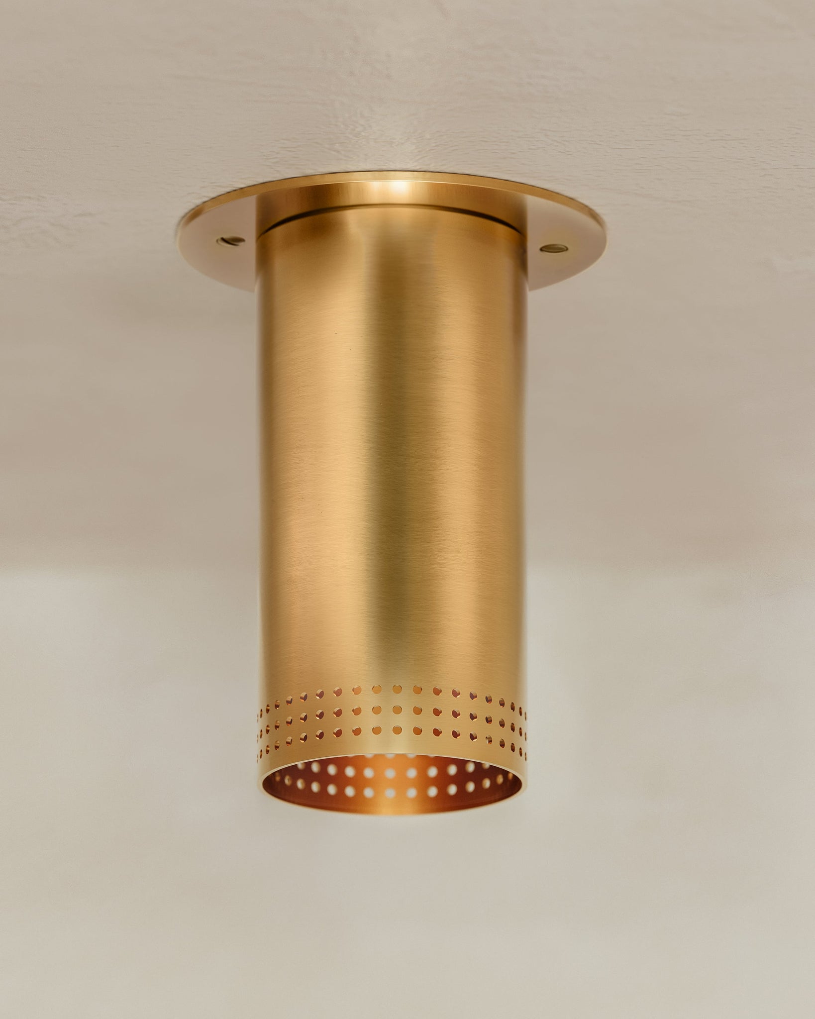 Berg Flush Mount styled in an entryway for warm, layered light at Laurie Yapp Home.