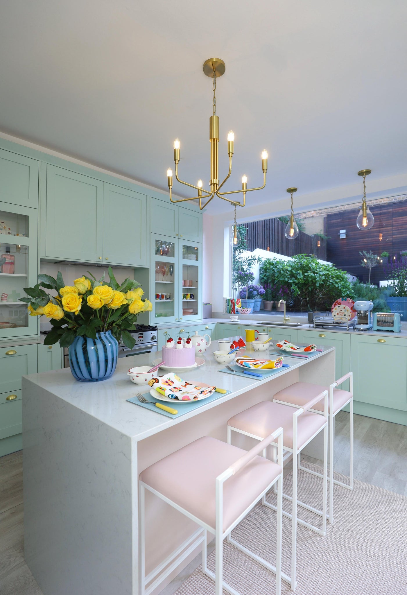 Ivy Pendant 7.5" in aged brass styled in an elegant dining room for warm, layered light at Laurie Yapp Home.