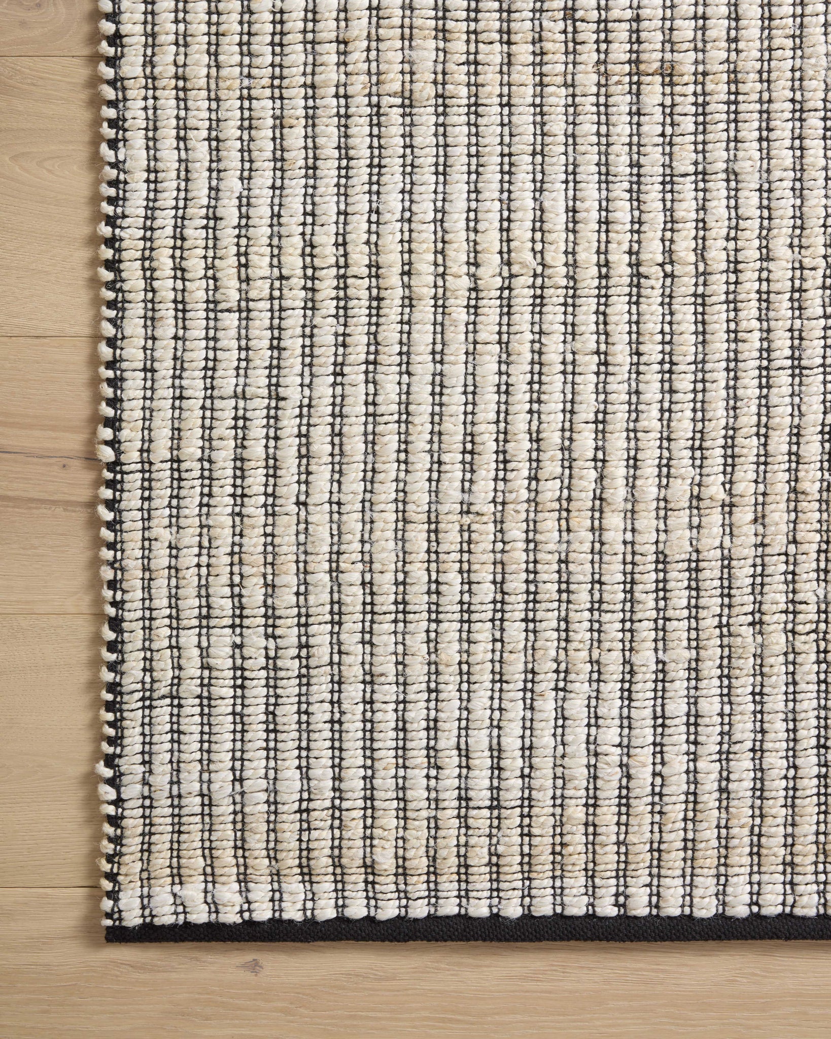 Colton Ivory / Black shown from a different angle to reveal its pattern.