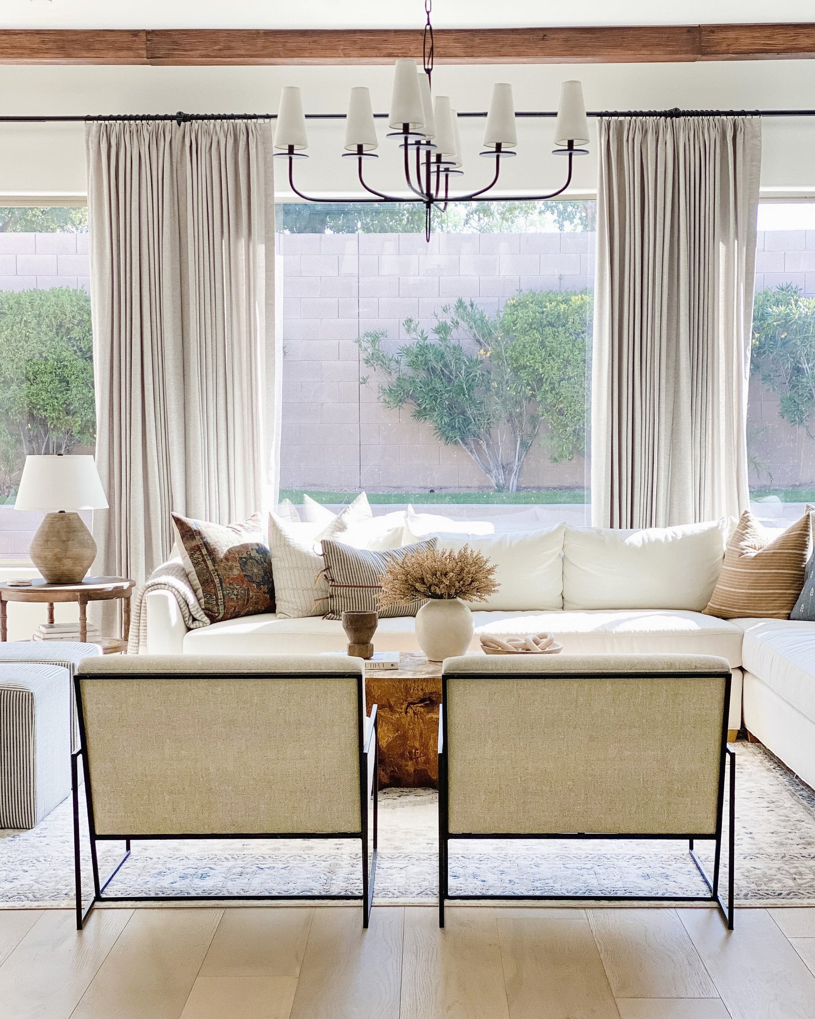 Calabria Table Lamp 22" styled in a curated console for warm, layered light at Laurie Yapp Home.