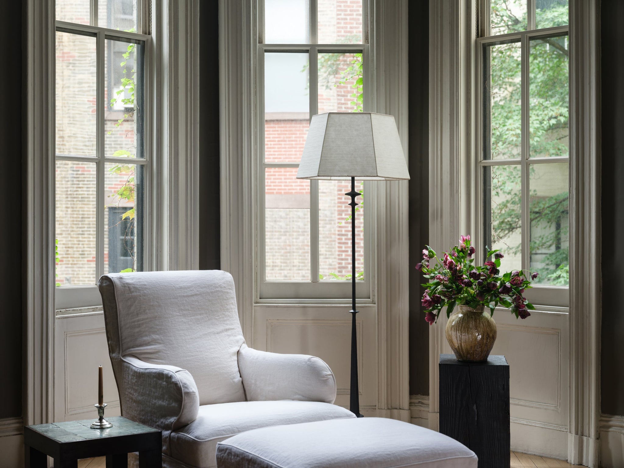 Celmins Floor Lamp styled in a living room corner for warm, layered light at Laurie Yapp Home.