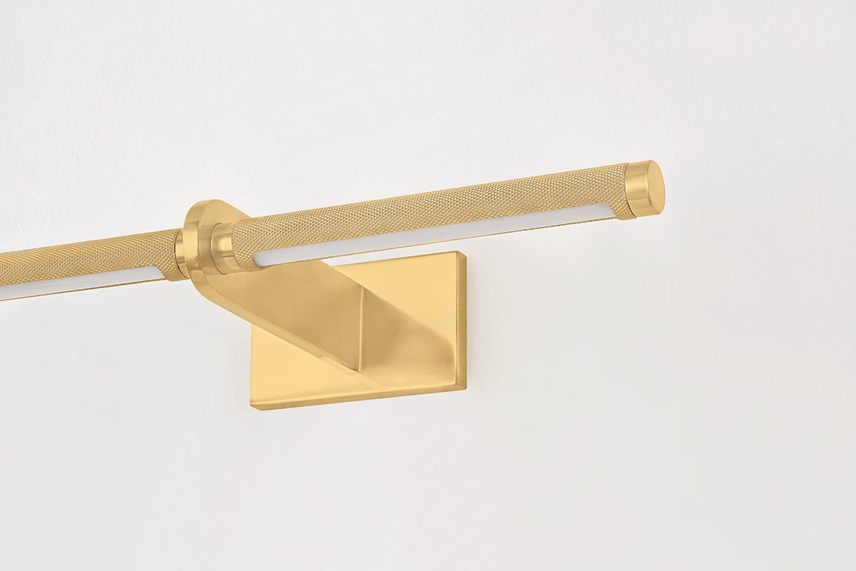 Deptford Picture Light 18" in aged brass shown from the front to reveal the arm curve and shade proportion.