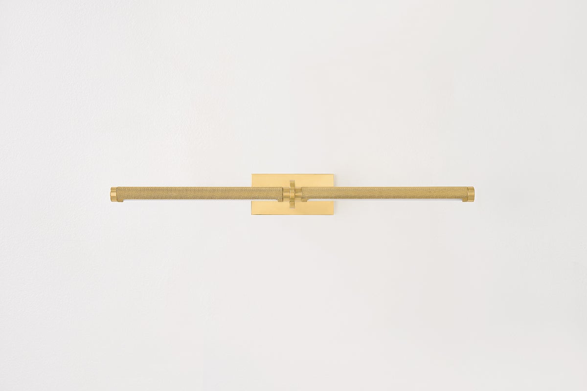 Deptford Picture Light 24" in aged brass shown from the front to reveal the arm curve and shade proportion.