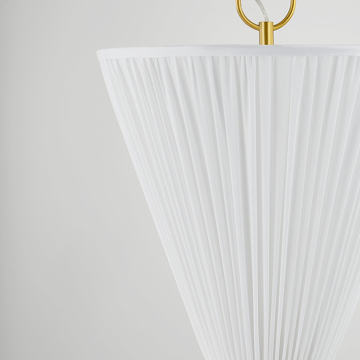 Enid Pendant 30" in aged brass shown from a second angle to highlight the shade shape and metal detail.