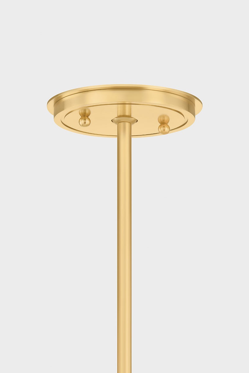 Gerhard Pendant in aged brass shown from a second angle to highlight the shade shape and metal detail.