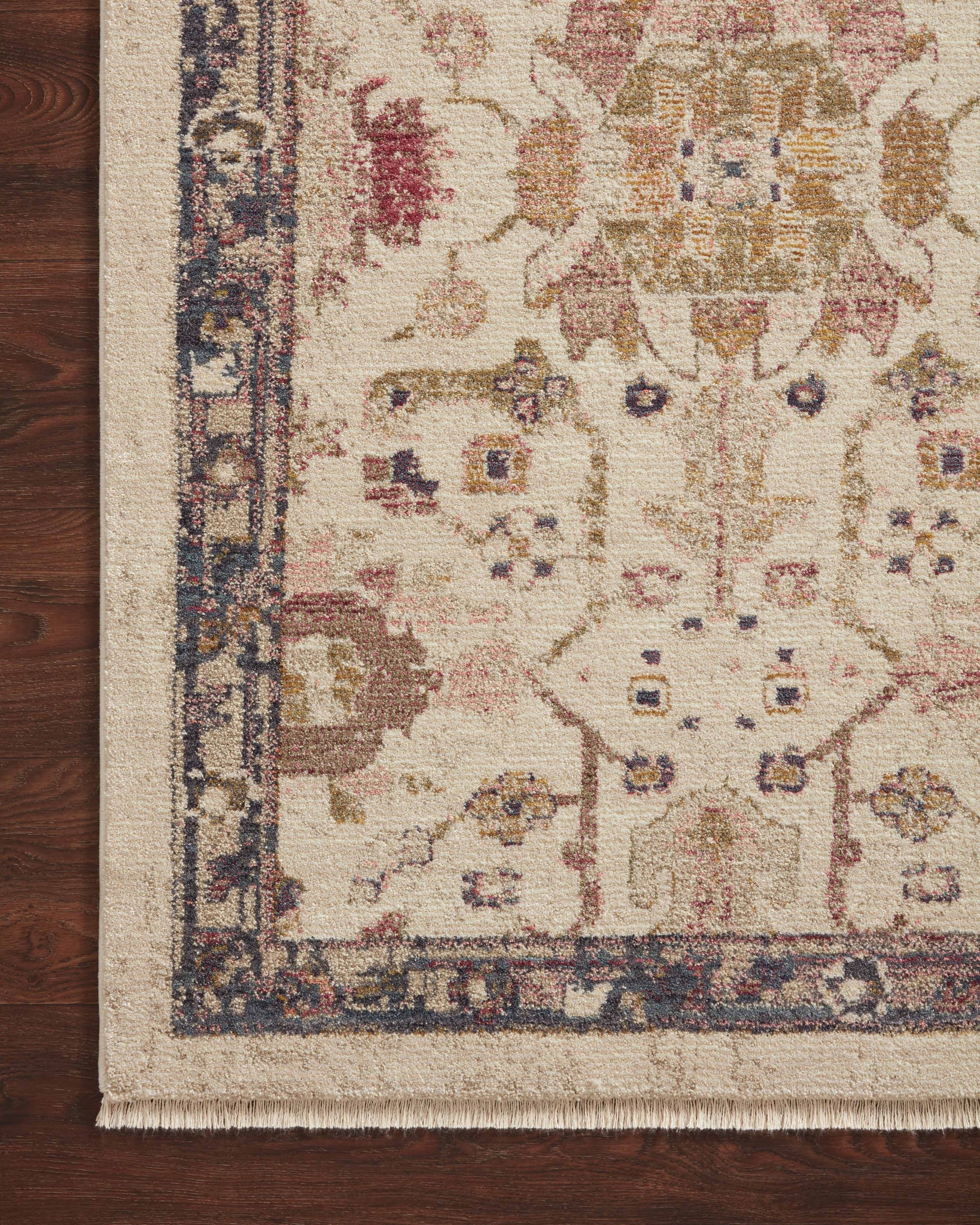 Close-up detail of the Giada Ivory / Multi showing its pile and weave.