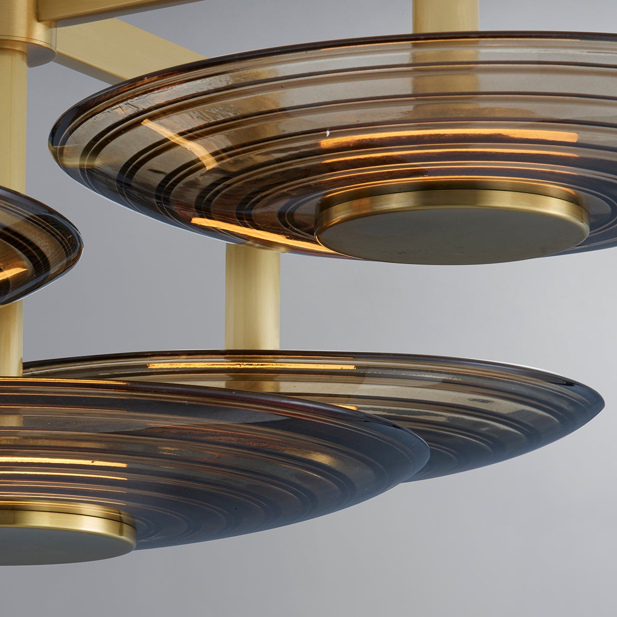 Griston Semi Flush 28" in aged brass shown from the front to reveal the shade profile and mounting canopy.
