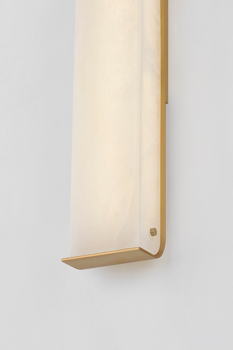 Close-up of the Hera Wall Sconce 4.25" x 26" showing the arm curve and shade silhouette.