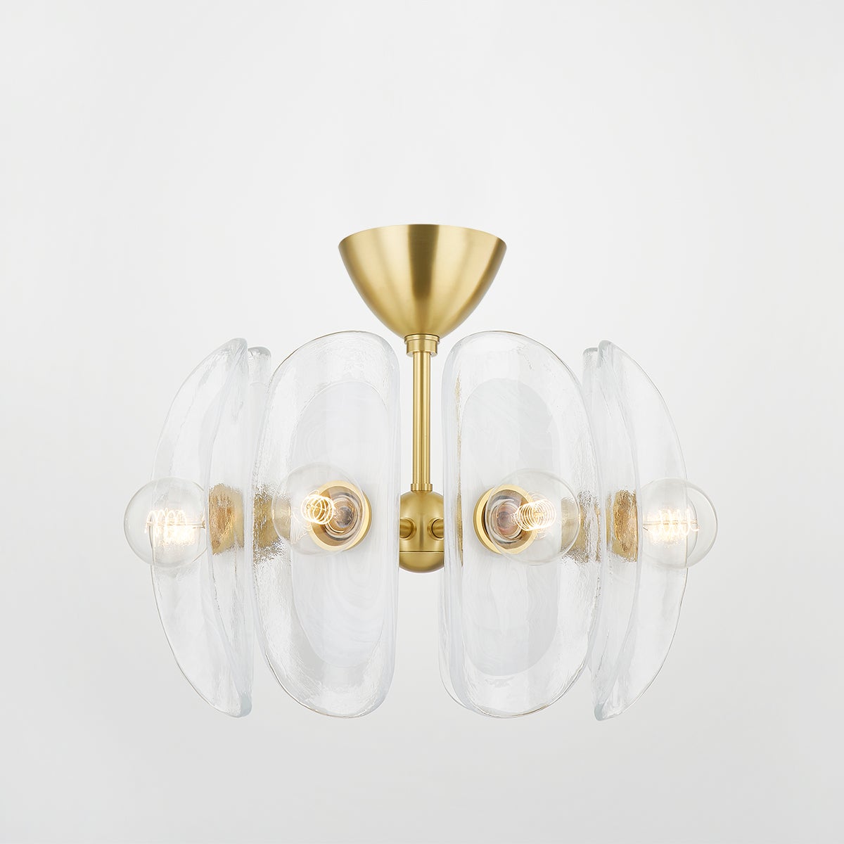 Hilo Semi Flush in aged brass shown from a second angle to highlight the shade profile and mounting canopy.